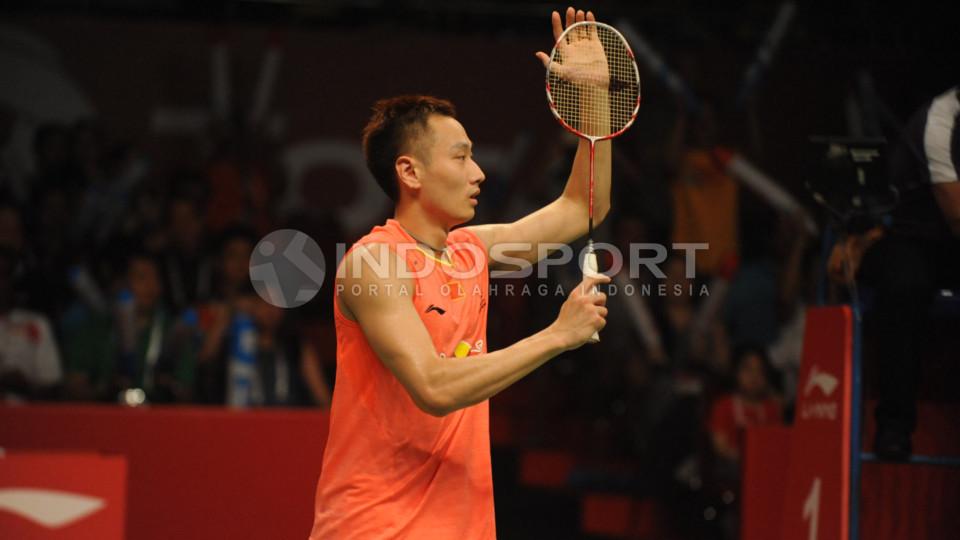 Ekspresi Zhang Nan usai mempertahankan gelar Juara Dunia.